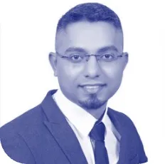 A person wearing a suit and tieDescription automatically generated
