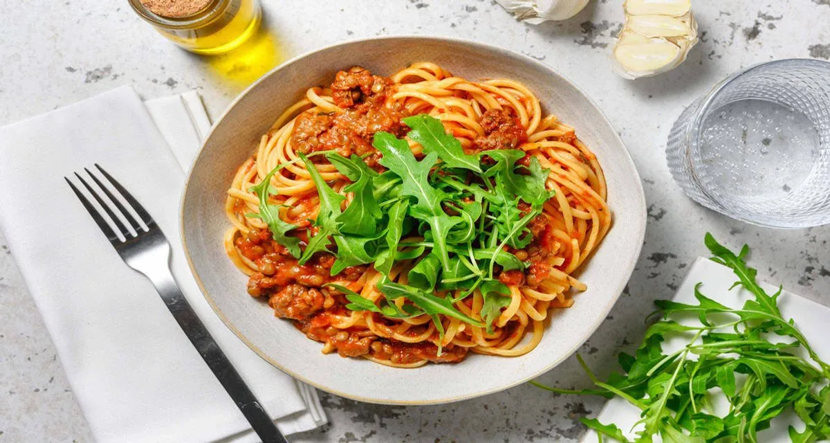 Beef and Lentil Linguine Bolognese with Italian Style Cheese and Rocket