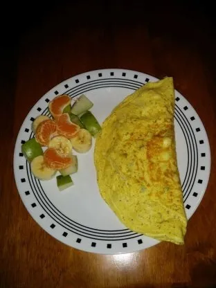 Eggs and Sausage Omelet With Tomatoes and Peppers