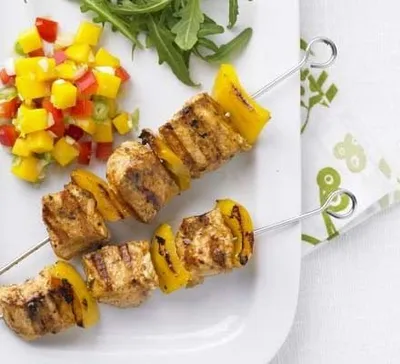 Jerk chicken kebabs with mango salsa