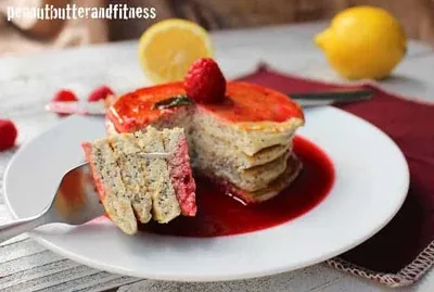 Lemon Poppyseed Protein Pancakes with Raspberry Syrup